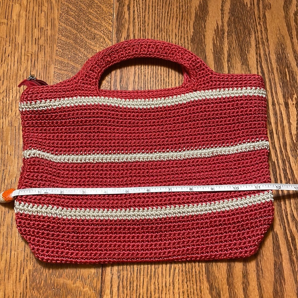 Cato Knit lined handbag. Great red and beige color with top handles.